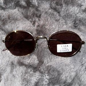 unisex sunglasses. Round brand new never used brown
